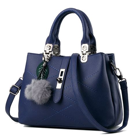 upscale handbags|fancy female handbags.